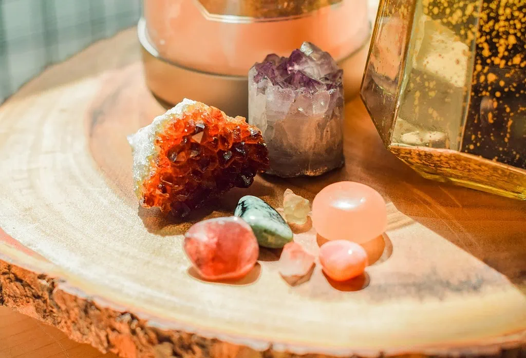 a wooden table topped with different types of rocks