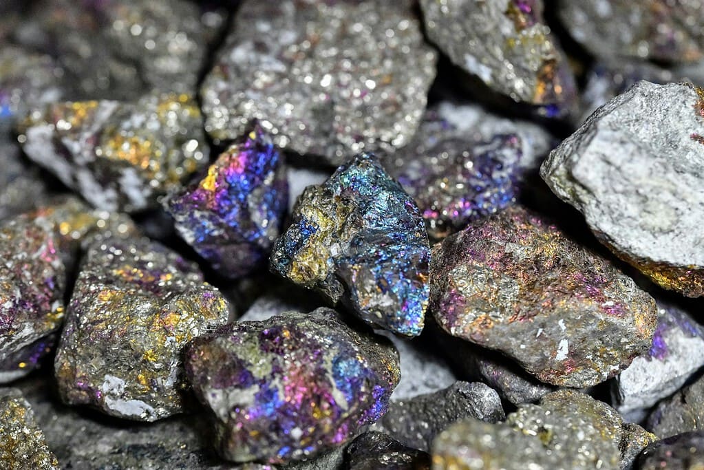 a pile of colorful rocks sitting next to each other